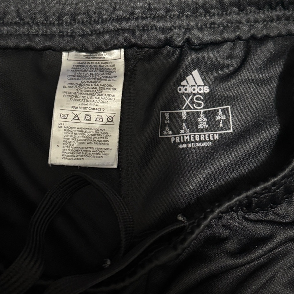 Women’s Black Adidas Tiro track pants with pink stripes. - Picture 4 of 7